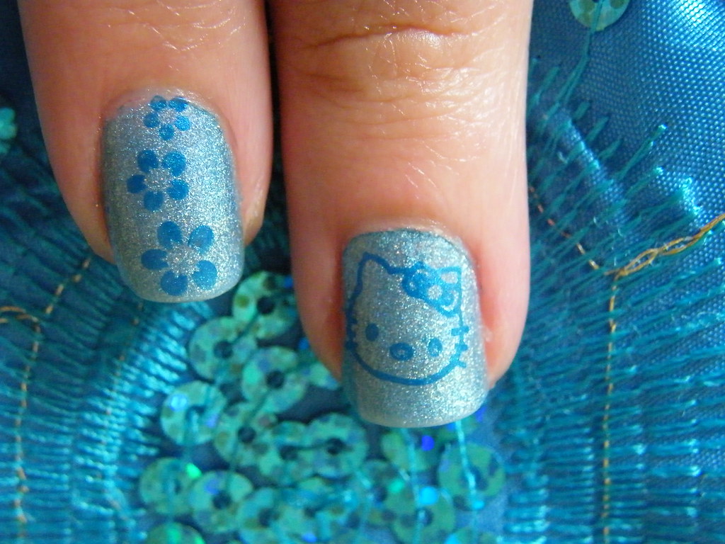 Hello Kitty nails My cute blue hello kitty nails. Made the… Flickr