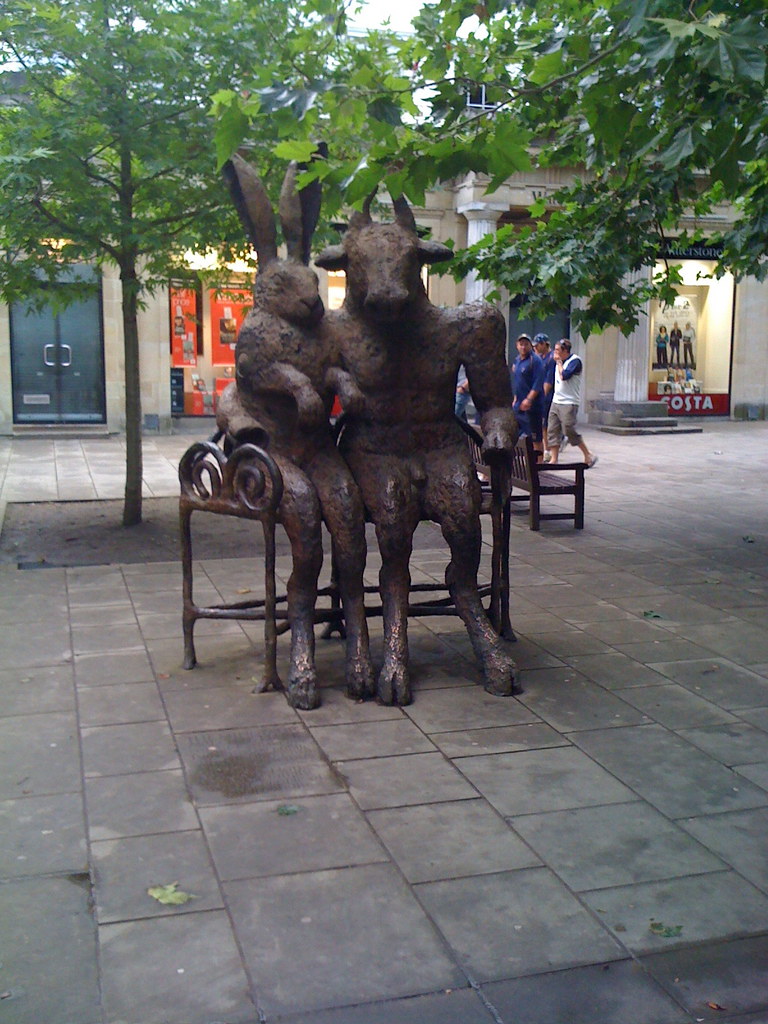 Cheltenham Weird statue in Cheltenham, a rabbit and a cow.… Flickr
