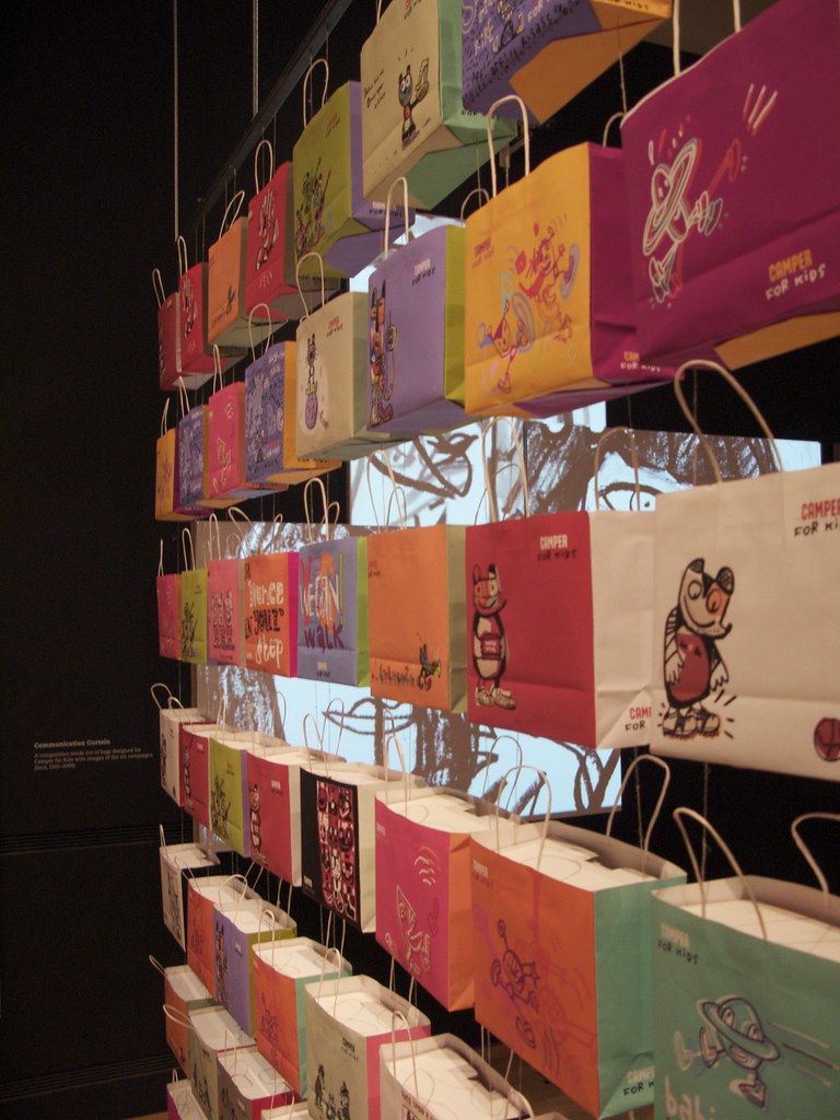 Shopping bag wall A nice wall of colourful shopping bags i… Flickr