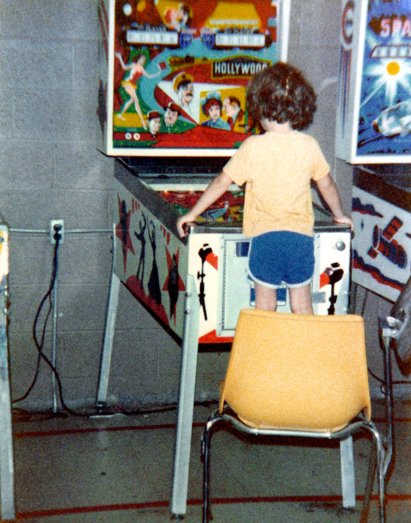 1979ish Clint playing pinball (by Dad) Probably one … Flickr