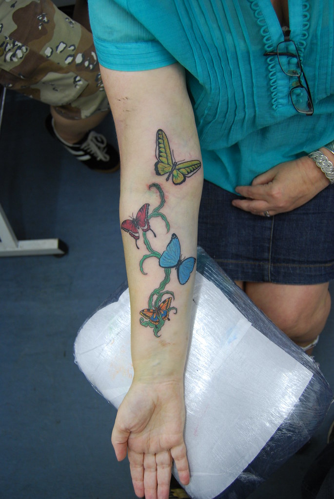 butterfly and vine tattoo on arm Tattooed by Johnny at; Th… Flickr