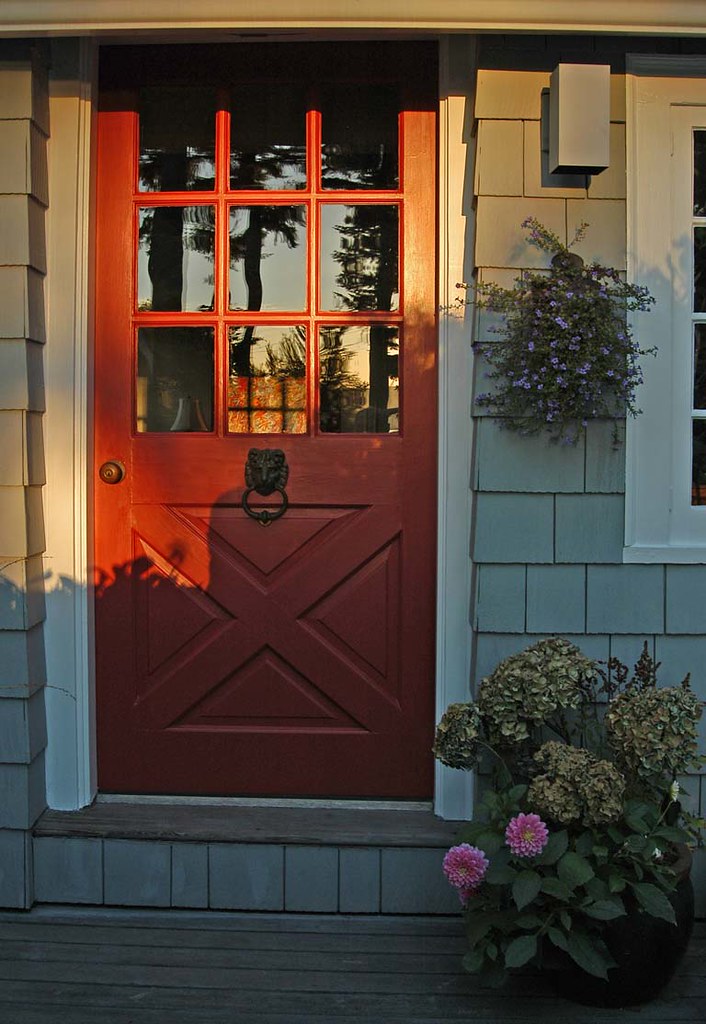 The new red door Someone painted their door. It's been gre… Flickr