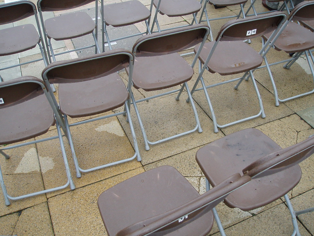 Vacated chairs 2 More orderly. Peter Briggs Flickr