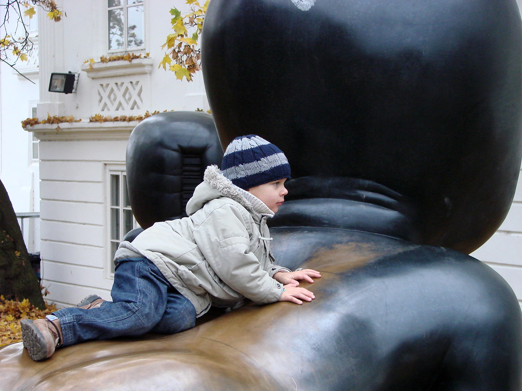 Child Plays on Giant Baby Sculpture by David Cerny Prague, Czech Republic a photo on Flickriver