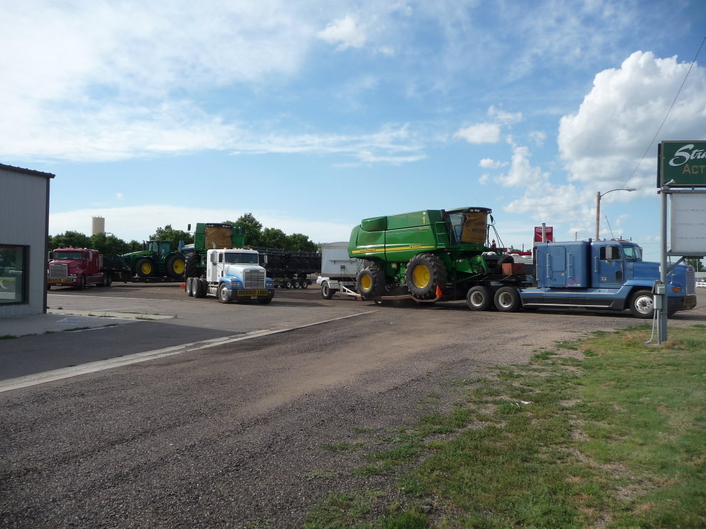 Week_10_2009_18 3 of the trucks with their loads. four4dots Flickr