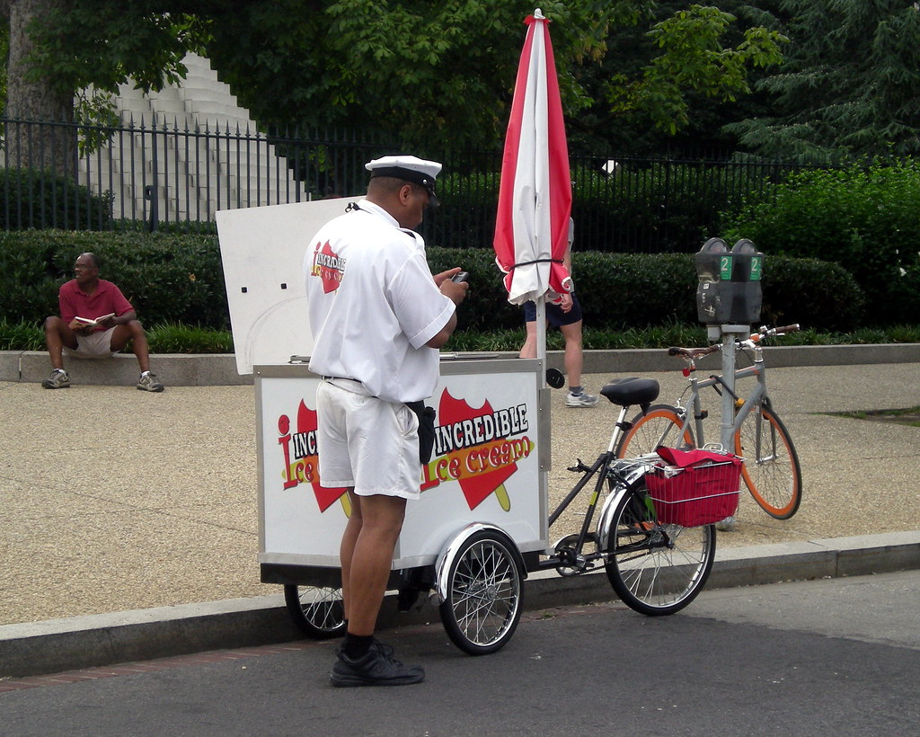 Ice Cream Man A bicycle cart ice cream man parked in front… Flickr