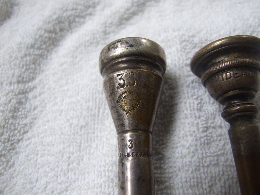 Selmer trumpet mouthpiece and Ideal mouthpiece with trumpet