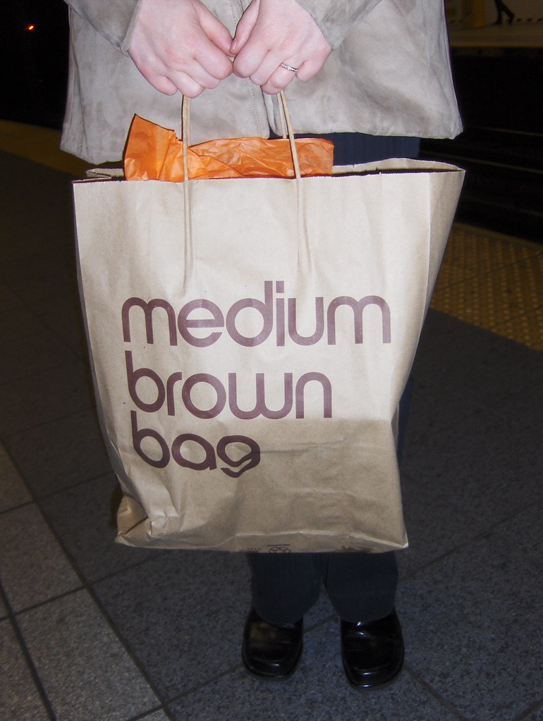 Medium Brown Bag Sue's bringing home all her birthday loot… Flickr