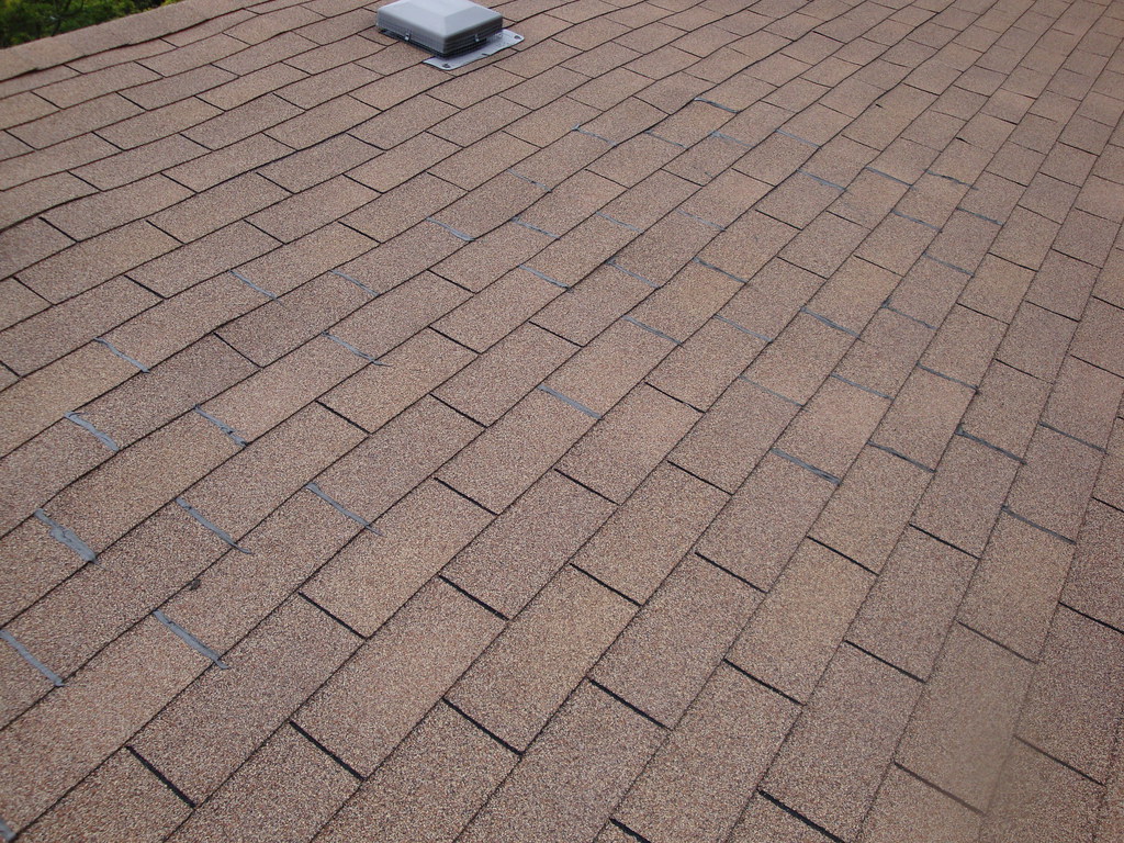 Uneven Buckling shingles sealed Uneven Buckling shingles s… Flickr