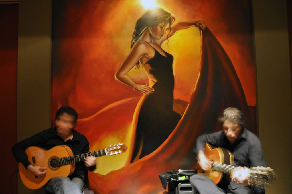 Spanish Guitarists Beautiful spanish guitarist playing dow… mindy W