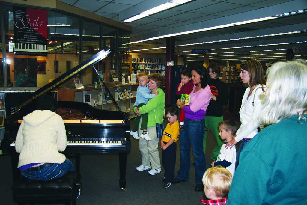Piano Gala 021 People enjoy the formal gala with piano