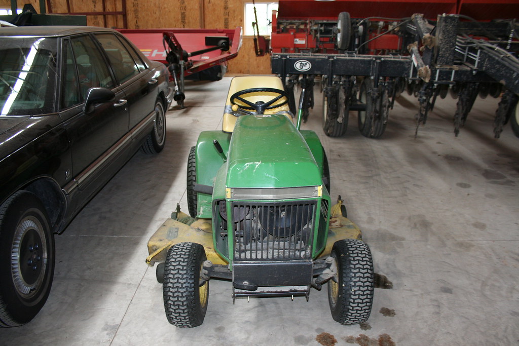 Storage shed John Deere 210 Yer basic tool. Daniel X. O'Neil Flickr