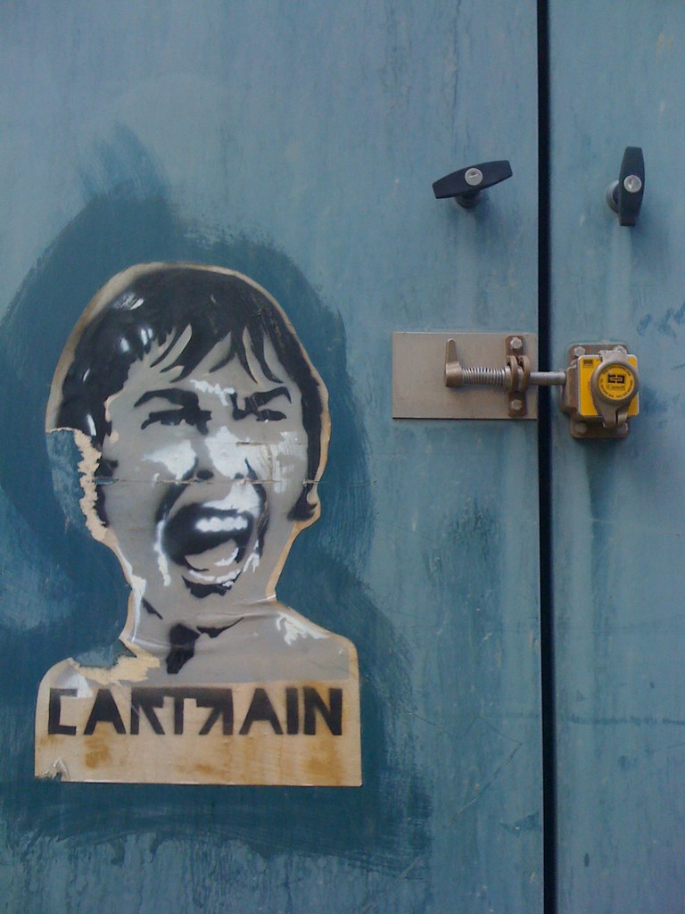 Paper & spray paint graffiti by Cartrain. Claire Cessford Flickr