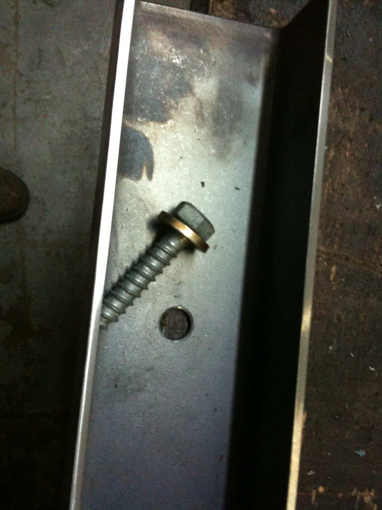 Lag bolt goes into stud Weld House LLC Flickr
