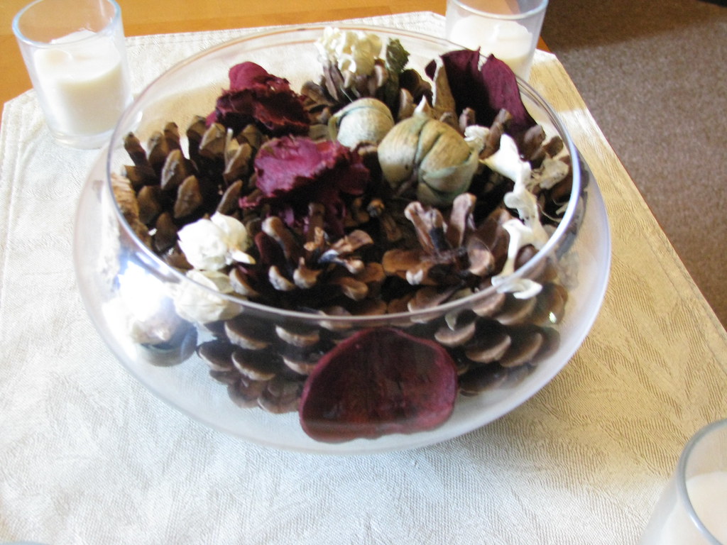 Centerpiece view 2 Glass bowl with real pine cones. Dark r… Flickr