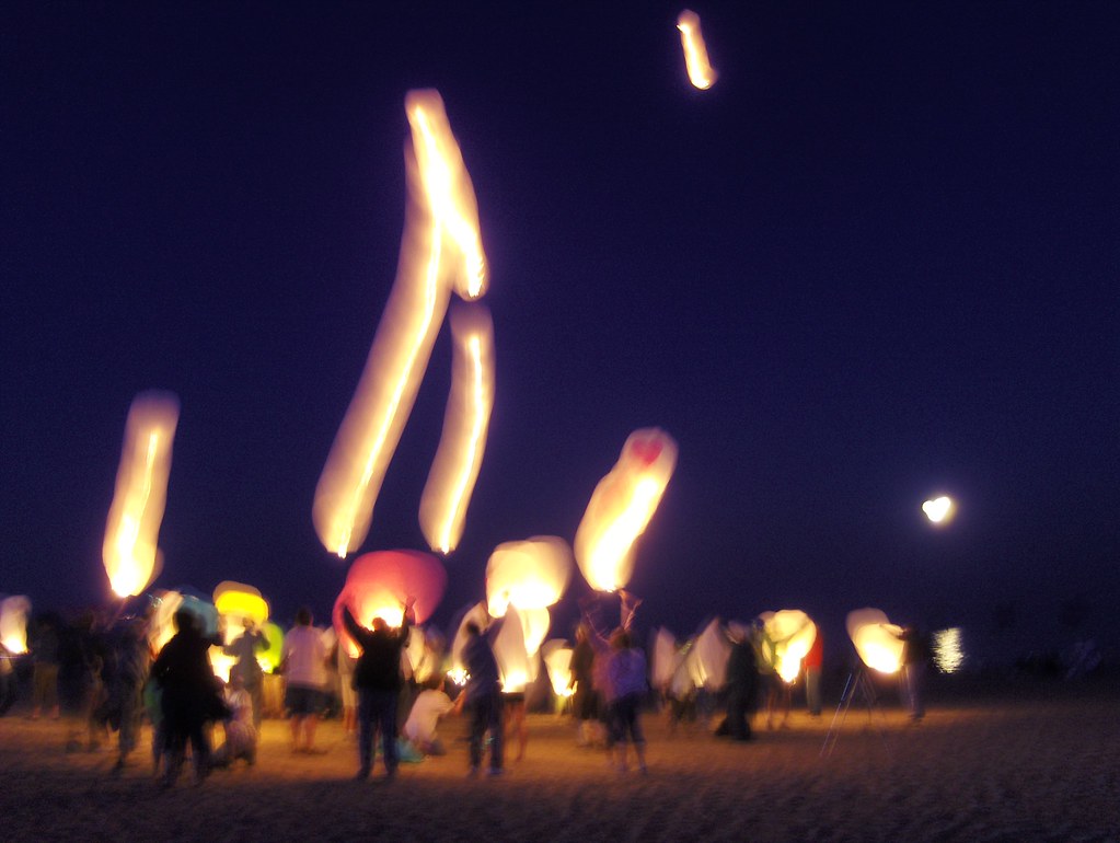 floating luminaries at the Kite Festival in Two Rivers Flickr