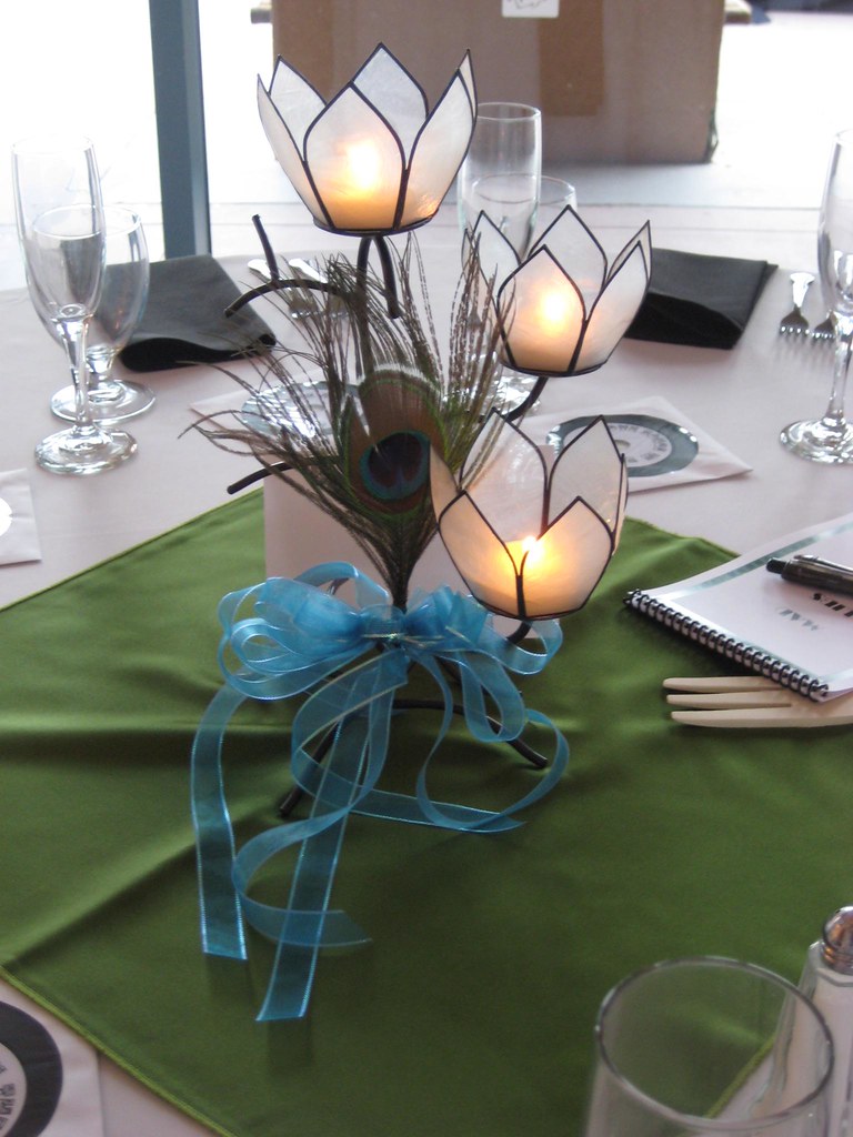 Wedding centerpieces with peacock feathers For a wedding o… Flickr