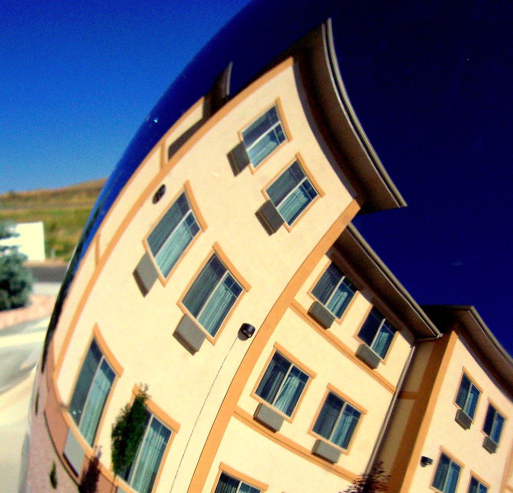 Bendy Hotel reflected in car's side mirror. Kemmerer, WY. Flickr
