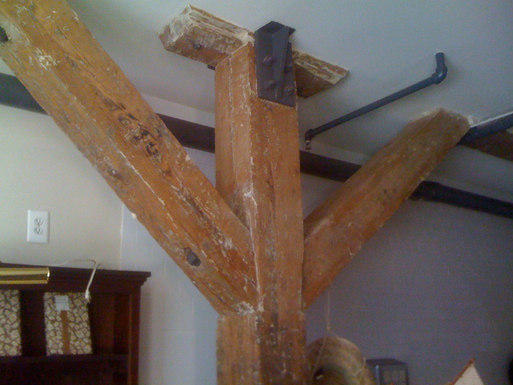 bolted industrial timber frame. notice how the knee braces… Flickr
