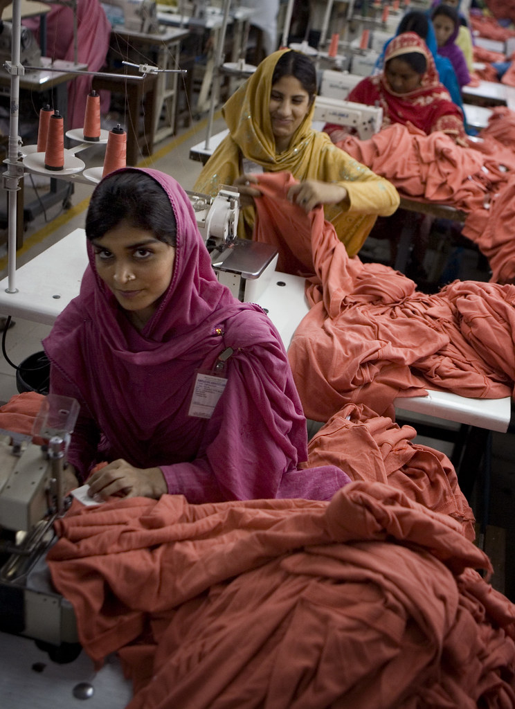 Women working in a garment factory in Faisalabad, Punjab Flickr