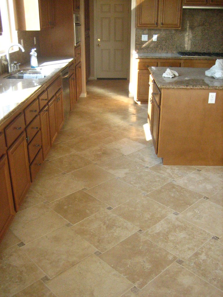 Tumbled Travertine Kitchen floor set in a pinwheel design… Flickr