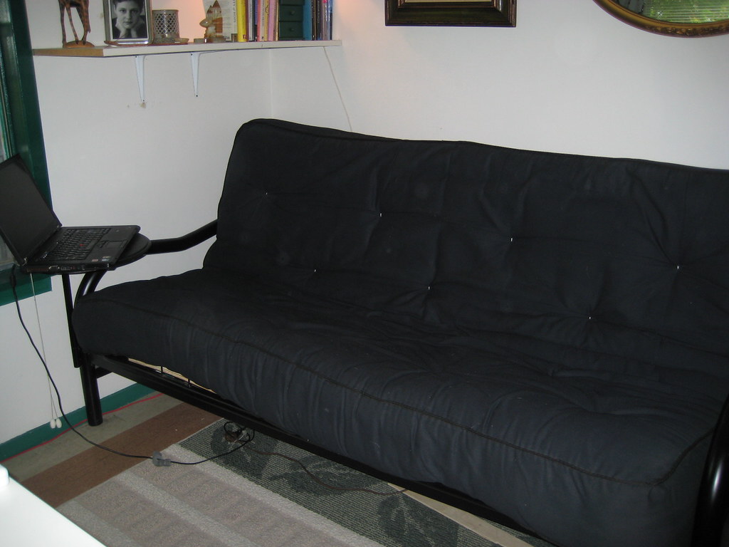 Fold out futon Black fabric with washable tan cover. Fair … Flickr