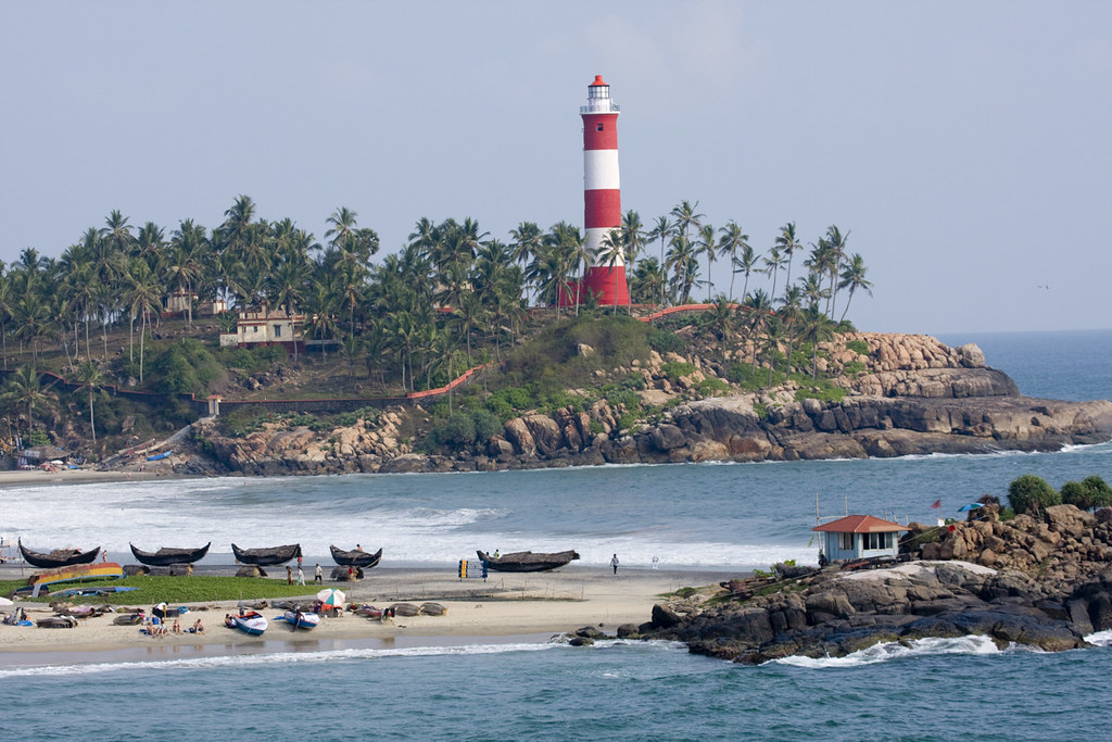Kovalam Lighthouse Kovalam is a sheltered natural bay, its… Flickr