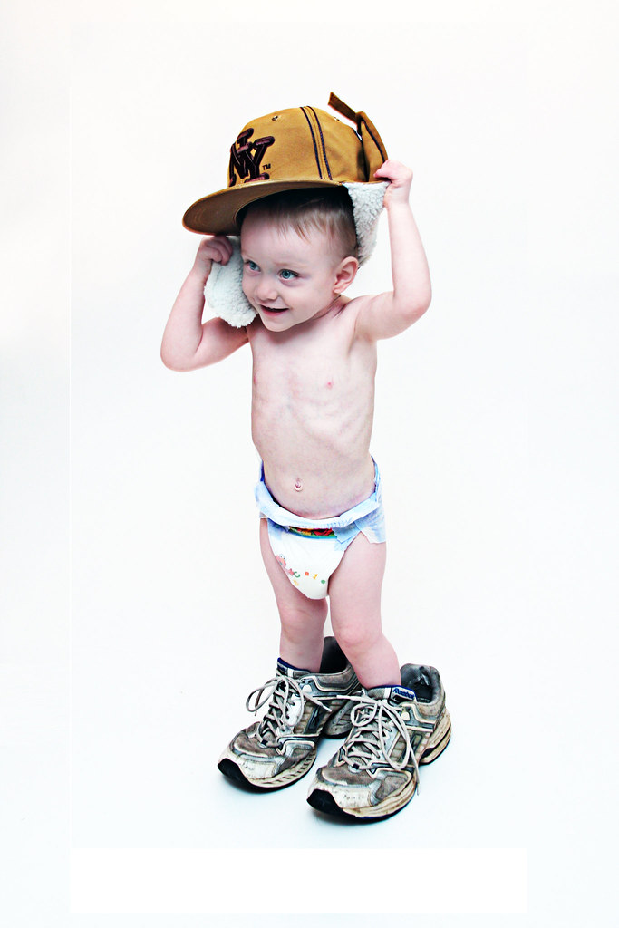 Walking In Daddy's Shoes Walking in daddy's shoes. Flickr