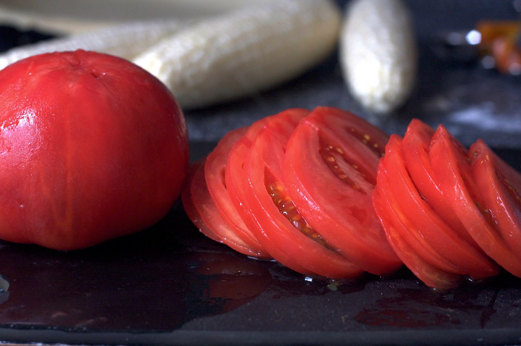 peeled, sliced beefsteak tomatoes From Jersey, like all go… Flickr