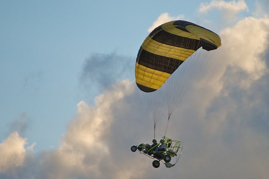 Powered Parachute This powered parachute flies over our ho… Flickr