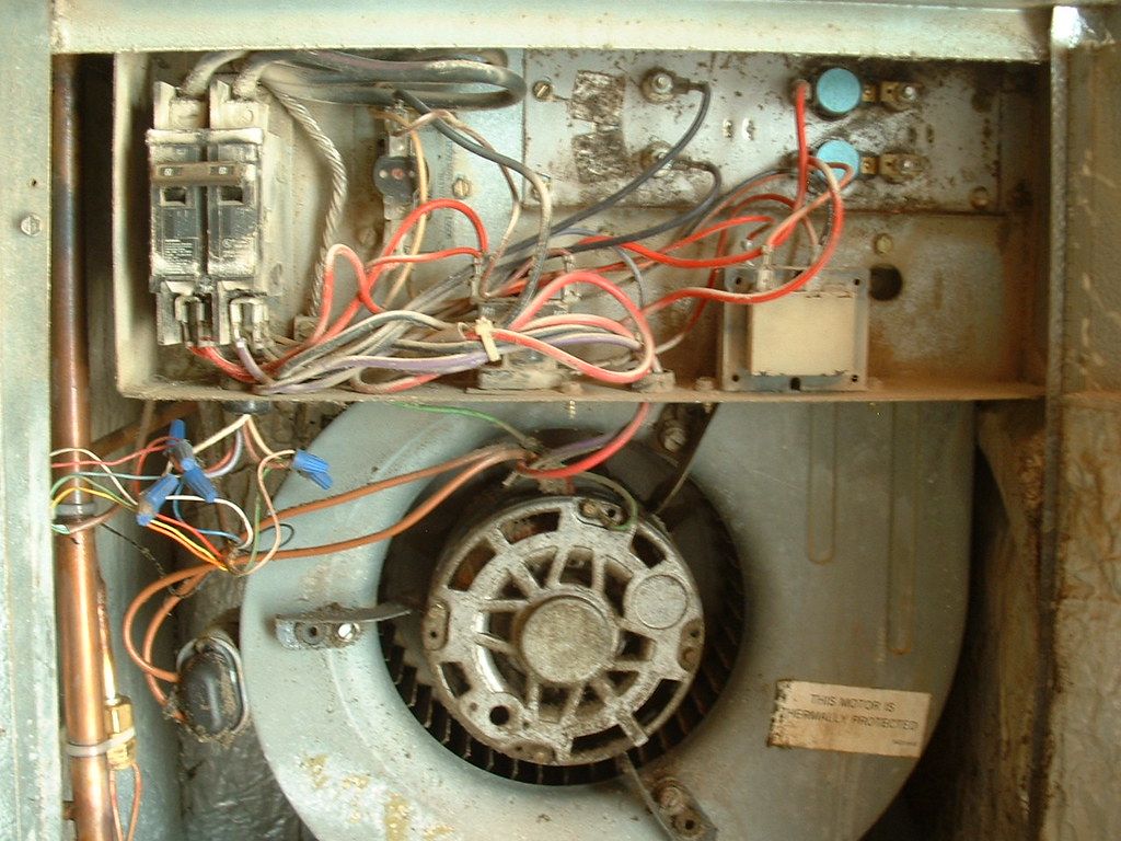The innards of the old heat pump/AC Part of the Shit Happe… Flickr