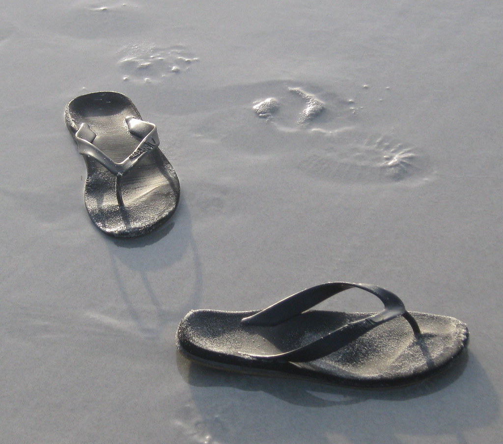 flip flops wet sand Paul Terrill Flickr
