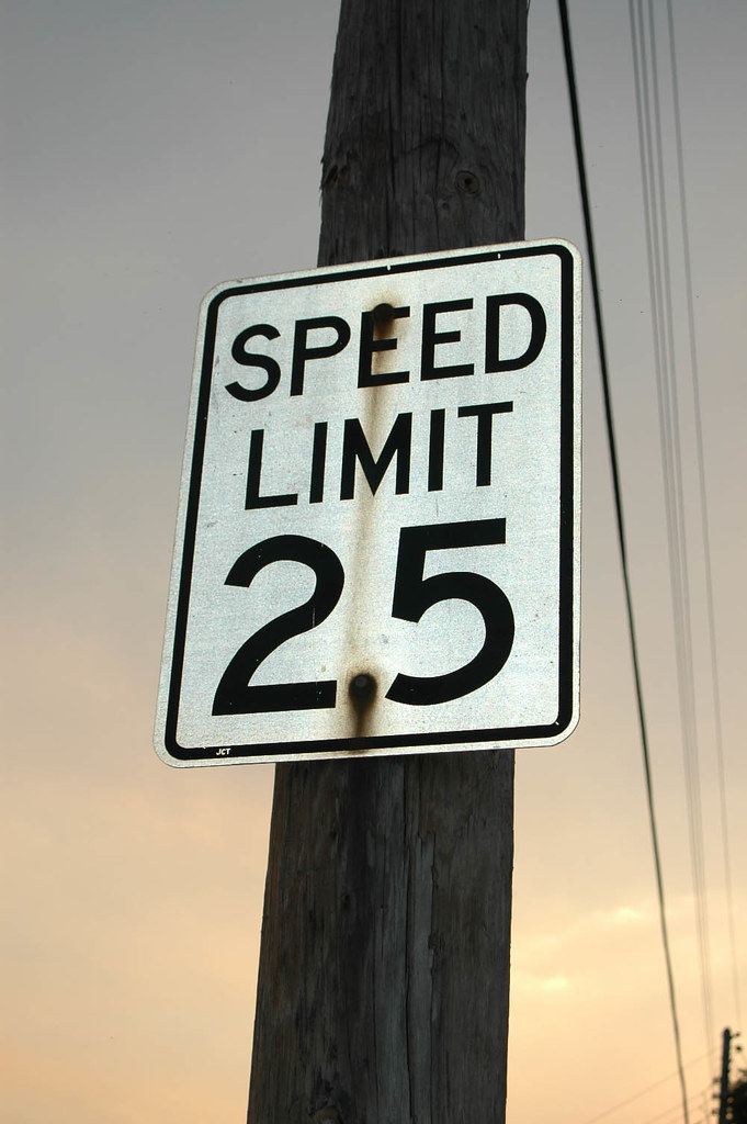 25 miles per hour speed limit sign with sun set just a spe… Flickr