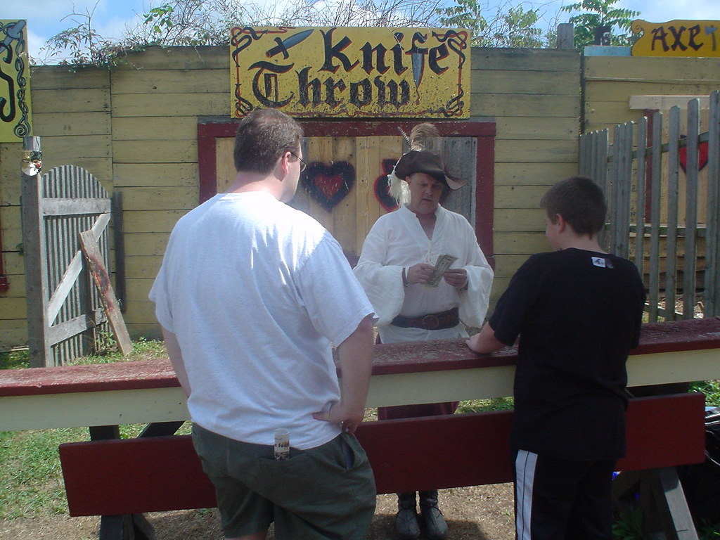 Setting up the knife throw A Knife throwing contest! Heeeh… Flickr