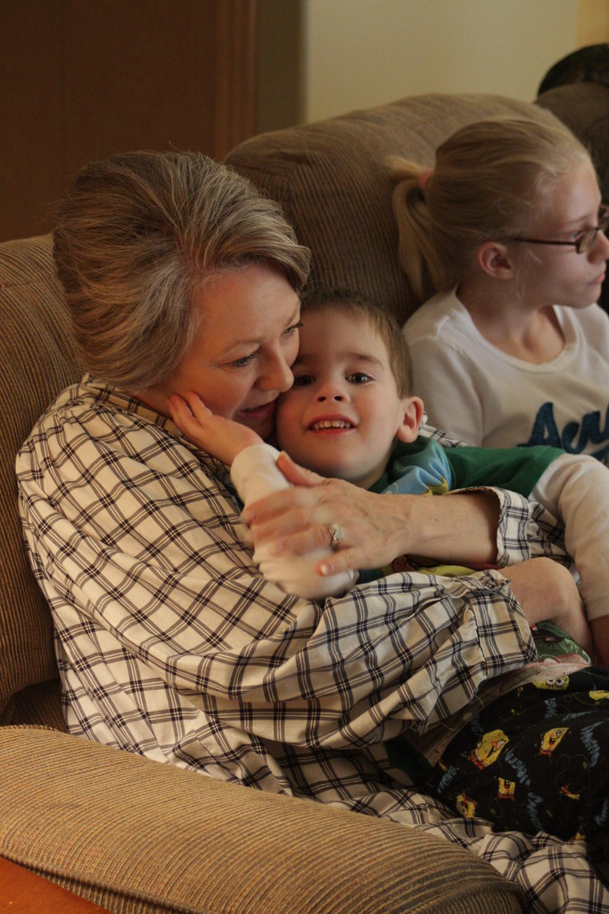 Nana and Jaden cuddle during the Christmas story tiffany.wells Flickr
