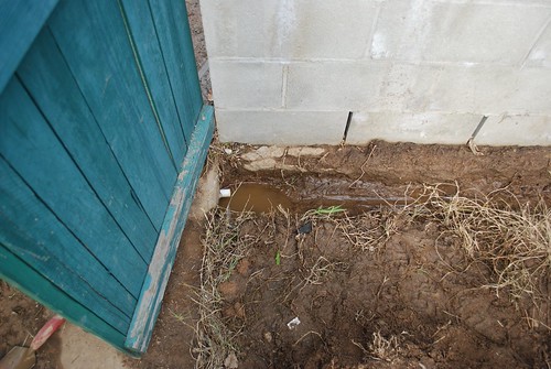 Used a garden hose to tunnel under the cinder block wall â€¦ Flickr