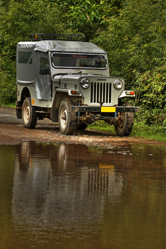 Mahindra CJ 4x4 A Mahindra CJ (500D?) jeep stands at the w… Flickr