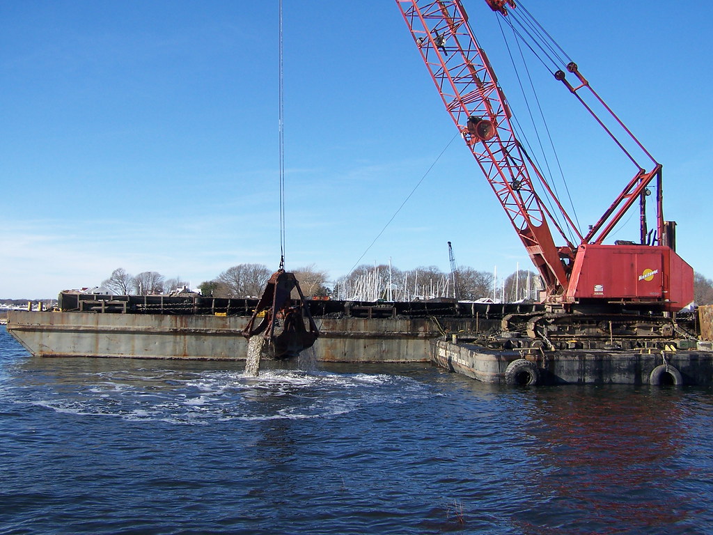Dredging Bullocks Cove in Barrington, RI The bucket dredge… Flickr