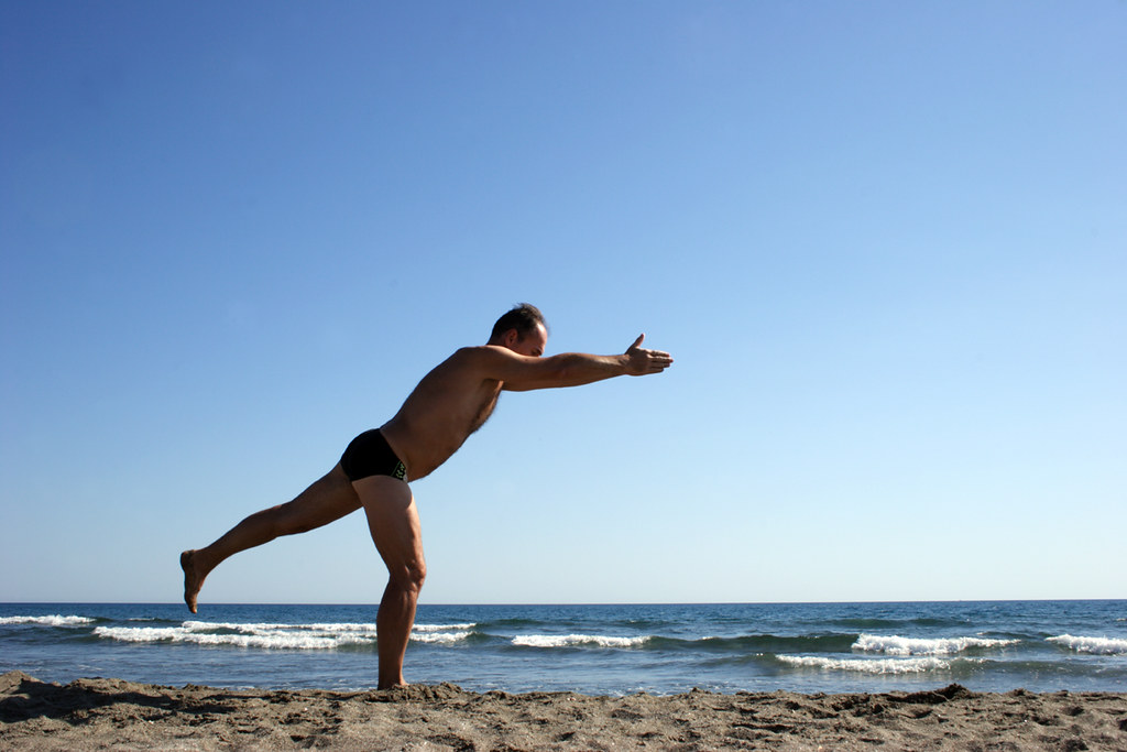 Beach Yoga 2 A bit of yoga in the morning is a good thing.… Flickr