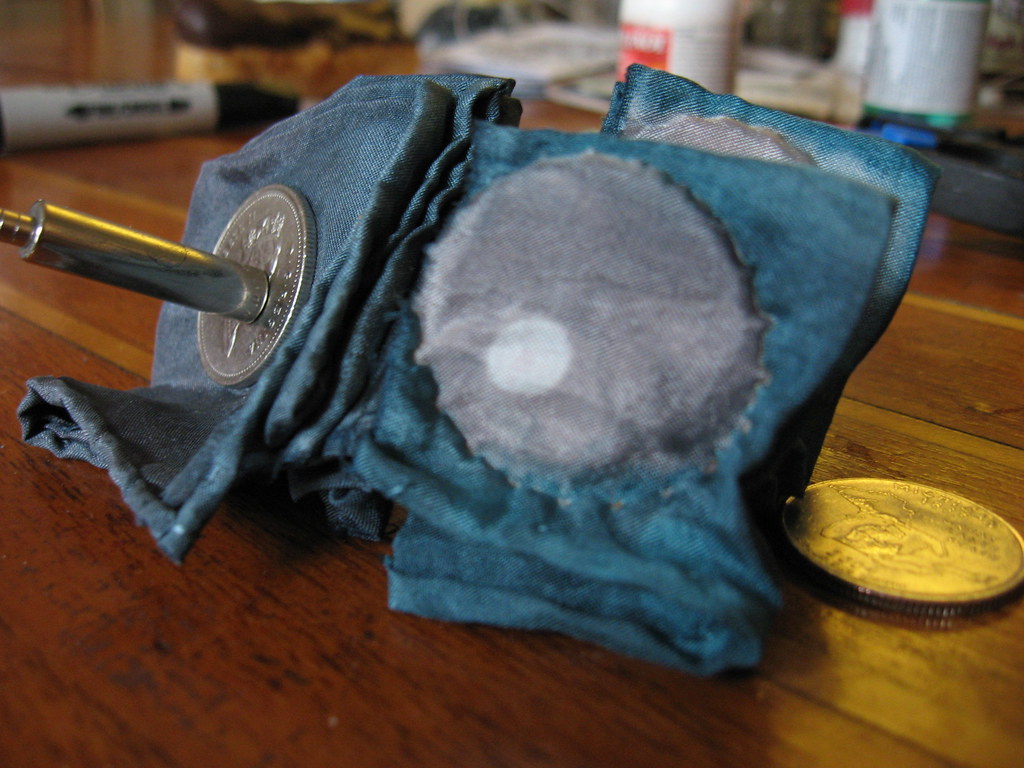 quarter resist on quarters (Canadian ones are magn… Flickr