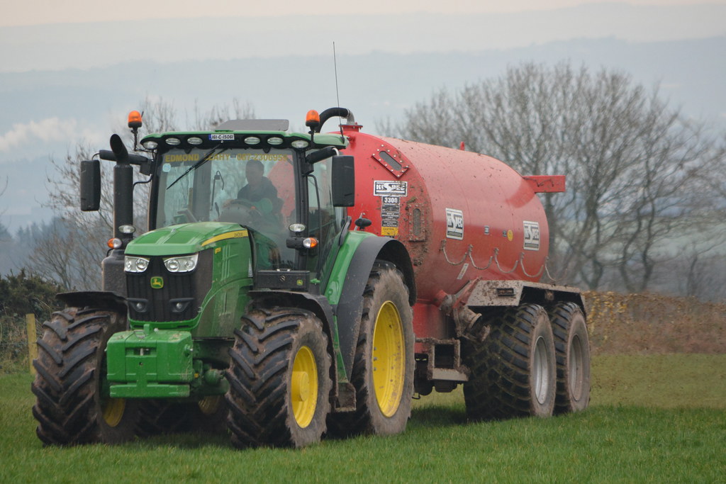 John Deere 6175R Tractor with a HiSpec 3300 Vacuum Slurry Tanker a
