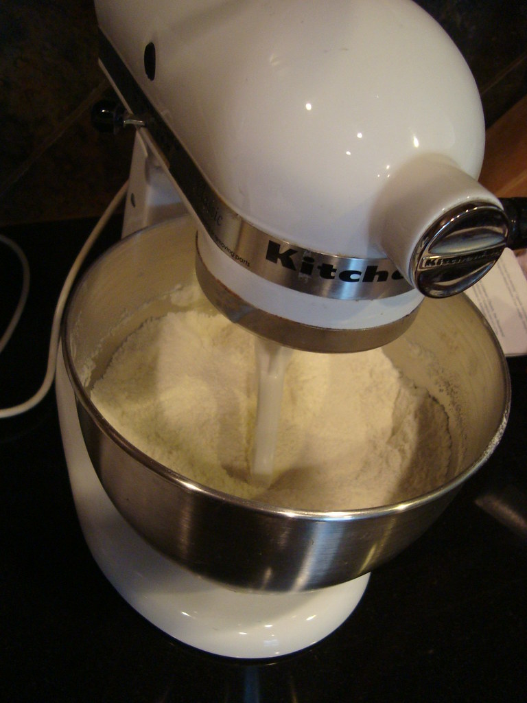 Mixing dry ingredients Cheesivore Flickr