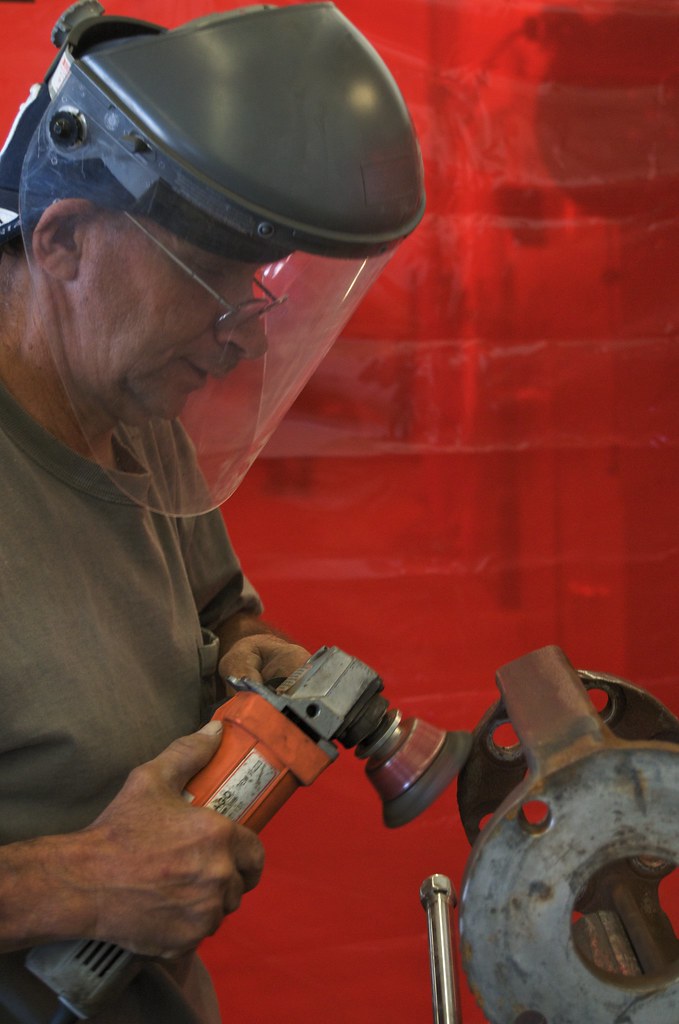 Working on Parts Man working on airplane parts Ashley Harrison EDA Flickr