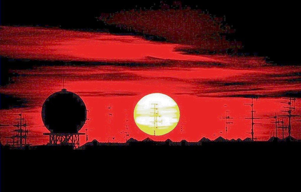 Radar tower and rising sun Mita09 Flickr