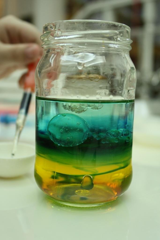 density fun blue is alcohol yellow is water bubble is oil Jimmie