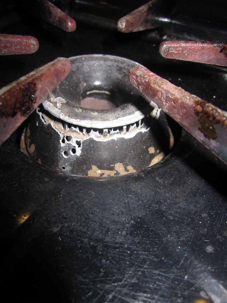 IMG_4337 Stove top is damaged and falling apart. Jamie Wheaton Flickr