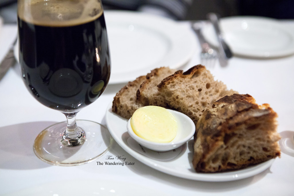 Grilled country bread and the glass of American stout on t… Flickr