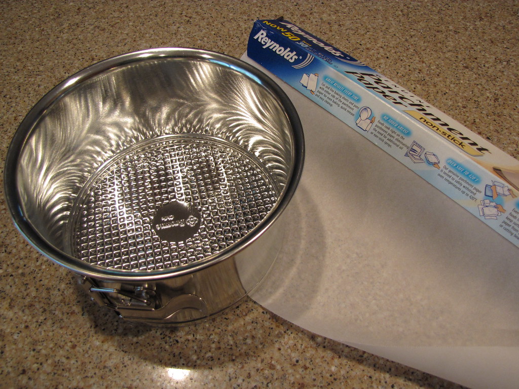 small springform pan & parchment paper idiotskitchen Flickr