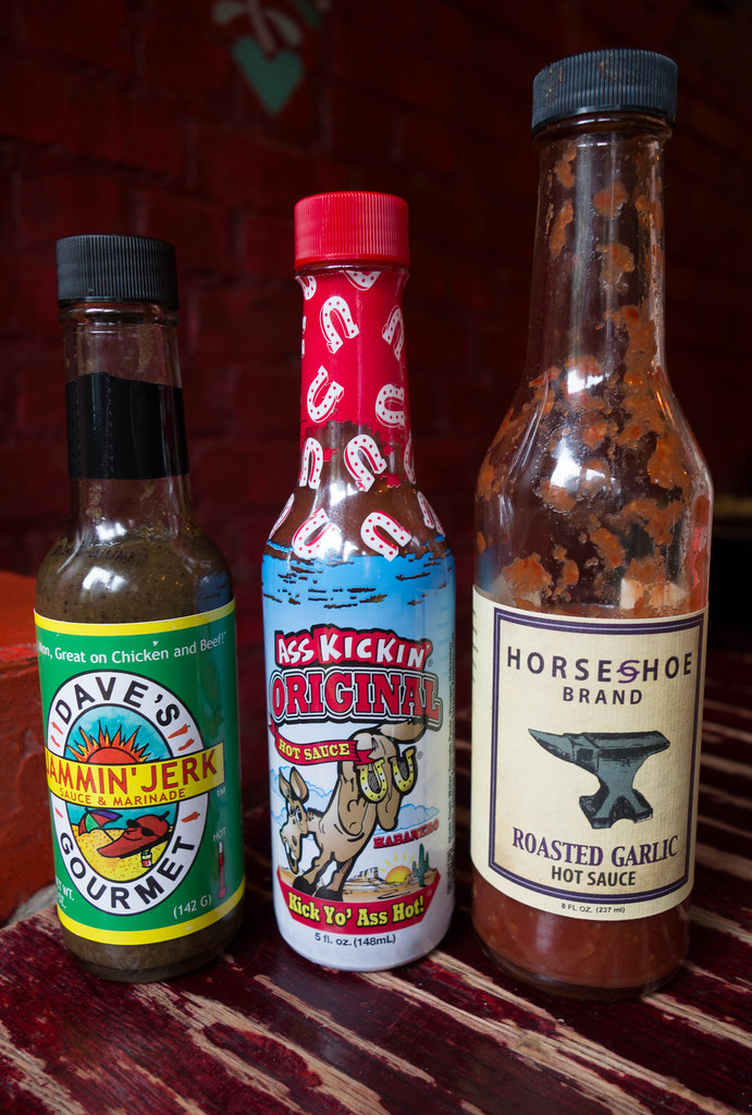 Hot Sauces at Mexican Radio photo by Scott Beale Scott Beale Flickr