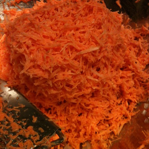 Hand grating a dozen sweet potatoes for sweet potato latke… Flickr